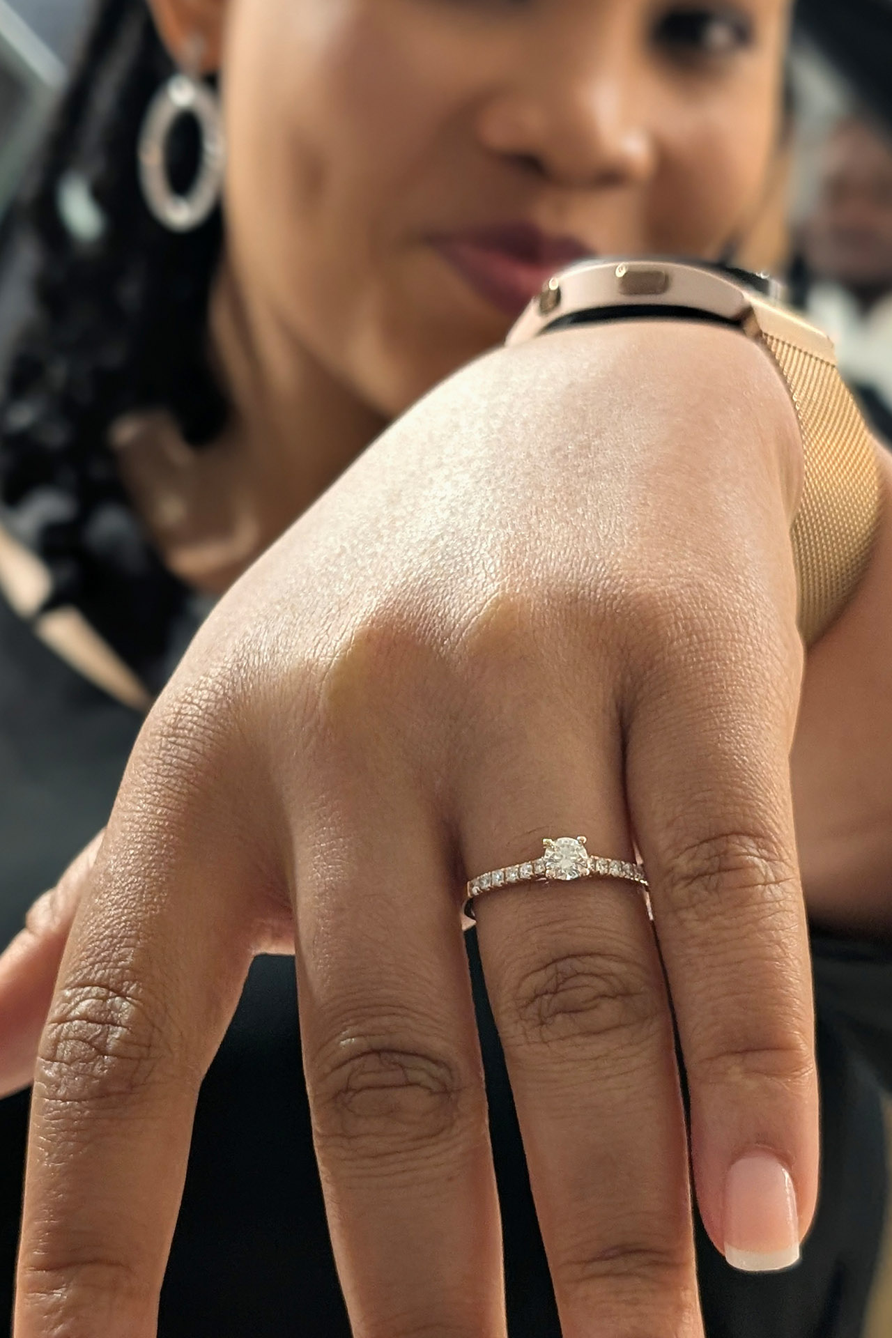 Beautiful Bride showing of her ring